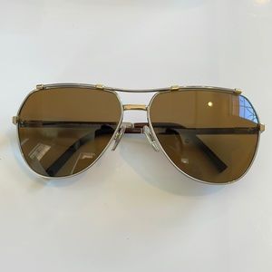 Dolce & Gabbana aviator sunglasses. Comes with cover, case, and original box.